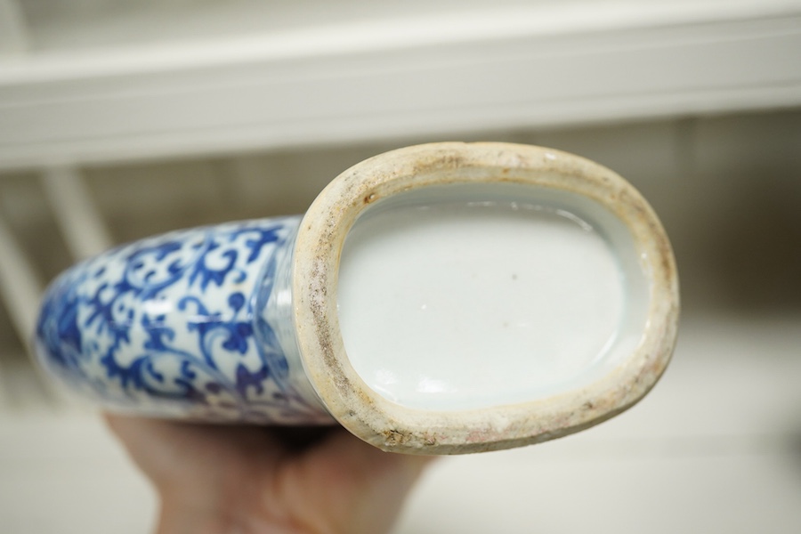 A pair of late 19th century Chinese blue and white moon vases, 23cm. Condition - one vase poor